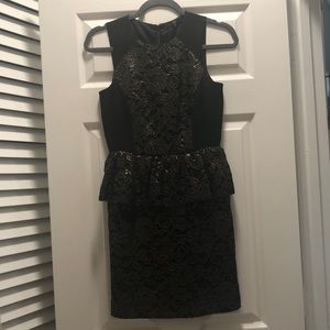 Black and gold peplum dress